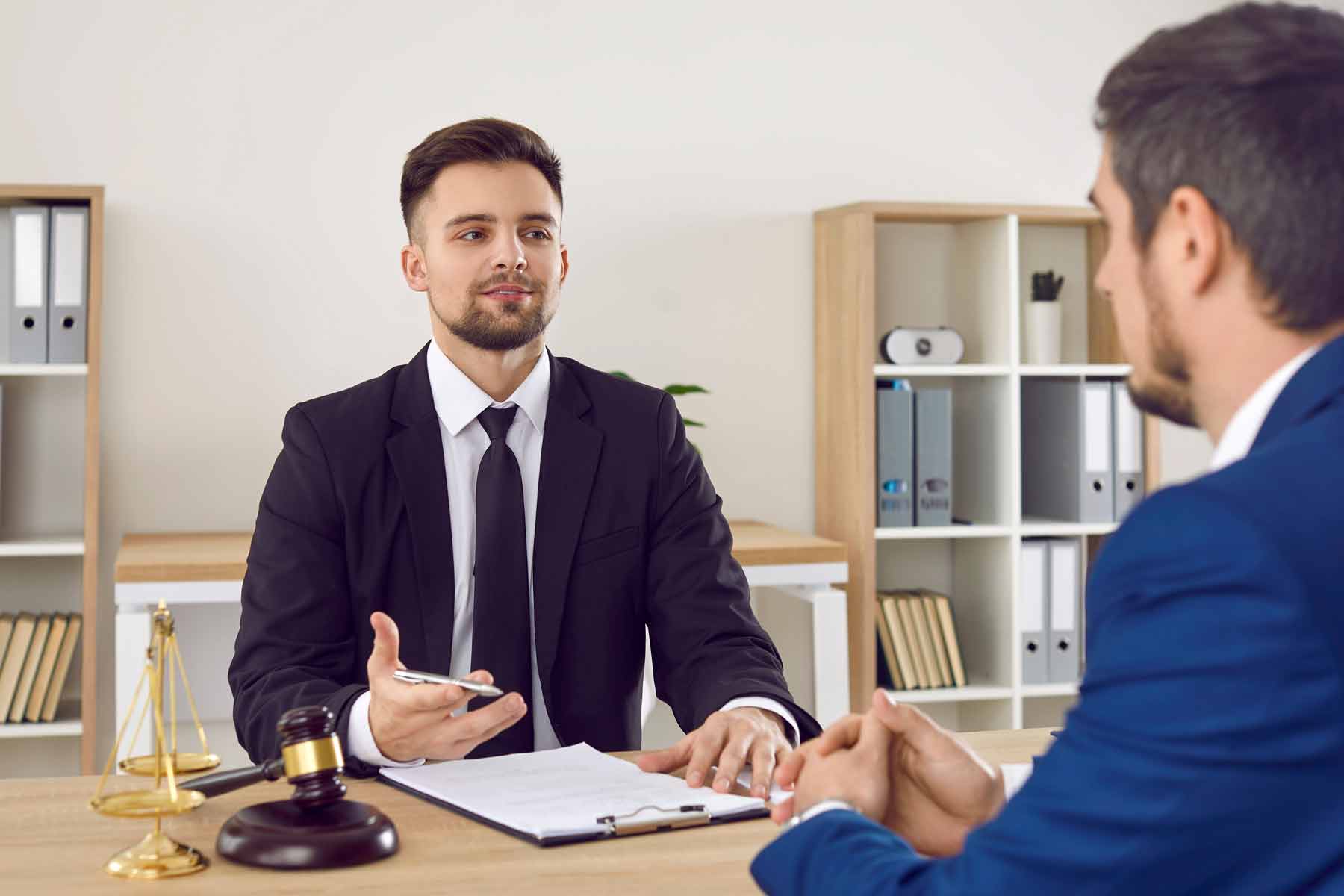 A lawyer providing legal advice about student loan during client consultation