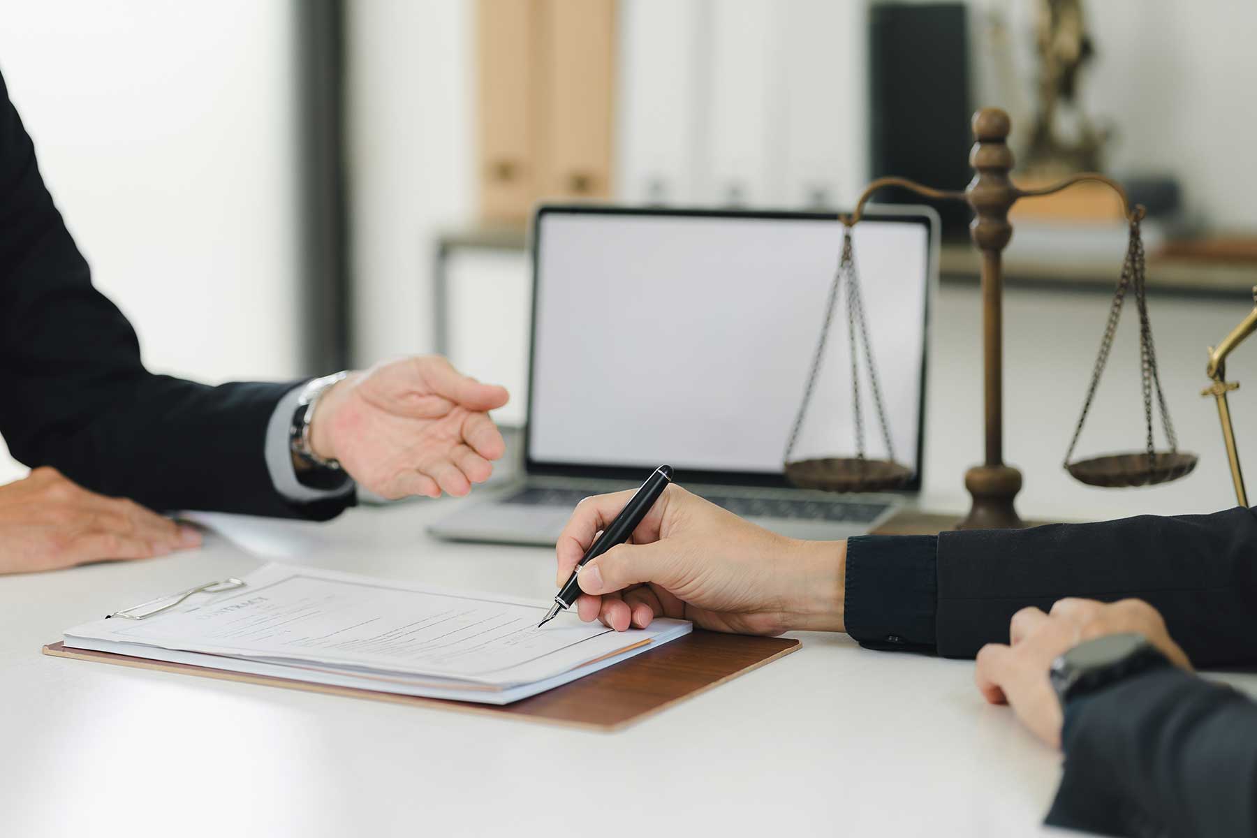 A lawyer discussing patent application with a client